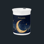 Personalized Crescent Moon and Stars Night Sky Beverage Pitcher<br><div class="desc">Create a personalized piece of celestial art with this enchanting watercolor painting. Featuring a luminous crescent moon bathed in a warm golden glow and a constellation of sparkling stars, this design invites you to add your own name, making it a truly unique and meaningful piece. The soft watercolor washes and...</div>