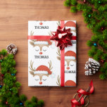 Personalized Cute Boy Christmas Reindeer Face Wrapping Paper<br><div class="desc">An adorable reindeer face decorates this gift wrap. Personalize it with the name of your choice. A perfect for wrapping your girls Christmas Presents. Designed for you by Blackberry Boulevard.</div>