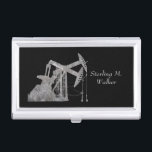 Personalized Distressed Metal Oilfield Design Business Card Case<br><div class="desc">The black background,  on this business card case,  can be changed to a different color by using the customization tools.  The design is of an oil pumping unit in a distressed metal look.  Personalize with your name.</div>