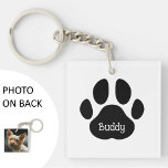 Personalized Dog Photo & Name | Puppy Paw Print Keychain<br><div class="desc">One side features a photo of your dog and the other side features a dog paw print in black (can be customized to any color you would like) with white text inside (e.g. dog's name) in white bone style font (can be customized to a different font or color as well)....</div>