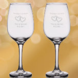 Personalized Elegant 50th Wedding Anniversary Gift Wine Glass<br><div class="desc">Create a meaningful keepsake with these elegant 50th anniversary etched wine glasses. Personalize these quality glasses with the couples names and wedding and/or anniversary date. Simple, elegant script saying "celebrating 50 years" can be edited to any number for another anniversary year. Two intertwined drawn hearts give an original romantic touch....</div>