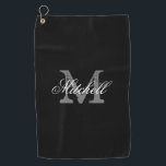 Personalized elegant monogram black golf towel<br><div class="desc">Personalized elegant monogram black golf towel. Monogrammed golfing gifts for men and women. Stylish script typography template for name and initial letter. Luxury Birthday gift ideas for golfer, husband, dad, father, friend, co worker, boss, colleague, coach, instructor, trainer, teacher, grandpa, retired person etc. Add your own surname or funny quote....</div>
