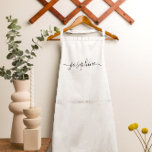 Personalized elegant script name white adult apron<br><div class="desc">Hosting a botanical, succulent workshop? How about a cooking class? Give out personalized white aprons for your guests with an elegant font script type that will surely delight them. Have the talking about this sophisticated giveaway. Tip: to keep the long swashes at the end keep the small squares at the...</div>