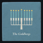 Personalized Family Name Hanukkah Menorah Blue Stone Coaster<br><div class="desc">Celebrate Hanukkah with this elegant personalized stone coaster featuring a beautifully designed menorah on a classic blue background. Perfect for adding a festive touch to your home decor, this coaster makes a thoughtful holiday gift or a stylish addition to your Hanukkah table setting. Customize with a family name for a...</div>