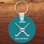 Personalized Field Hockey Team Name Jersey Number Keychain<br><div class="desc">This personalized field hockey design features 2 crossed field hockey sticks, a ball and your player's or coach's name, team name and jersey number. Personalize the background color to match your team colors - just click on "customize" and then the small eye dropper. This makes a perfect for an end...</div>