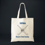 Personalized Field Hockey Team Name Jersey Number Tote Bag<br><div class="desc">This personalized field hockey design features 2 crossed field hockey sticks, a ball and your player's or coach's name, team name and jersey number. Personalize the background color to match your team colors - just click on "customize" and then the small eye dropper. This makes a perfect for an end...</div>