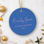 Personalized First Christmas Baby Photo Name Blue Ceramic Ornament<br><div class="desc">Celebrate your baby's first Christmas with this charming personalized ceramic ornament. The name side features a soft blue background with cute pink script writing, while the other side showcases a cherished photo. This adorable ornament is a perfect keepsake to commemorate this special milestone, adding a sweet and personal touch to...</div>