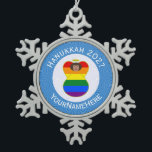 Personalized Gay Pride Brown Angel Hanukkah Flag Snowflake Pewter Christmas Ornament<br><div class="desc">Dark skinned angel, could be LatinX or Asian, wears the Gay Pride Rainbow Flag on this snowflake pewter ornament for Hanukkah decor. The Gay Pride Hanukkah Angel for LGBTQ is inside a circle of white squiggly squares surrounded by a background of blue squiggly squares. Add a name to personalize and...</div>