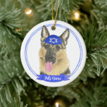 Personalized German Shepherd Dog Hanukkah Ceramic Ornament<br><div class="desc">Celebrate your favorite mensch on a bench with a personalized ornament! This design features a sweet illustration of a german shepherd dog with a blue and white yarmulke. For the most thoughtful gifts, pair it with another item from my collection! To see more work and learn about this artist, visit...</div>