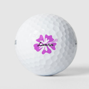 Personalized golf balls with pink Hawaiian flower