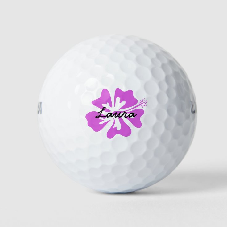 Personalized golf balls with pink Hawaiian flower Zazzle