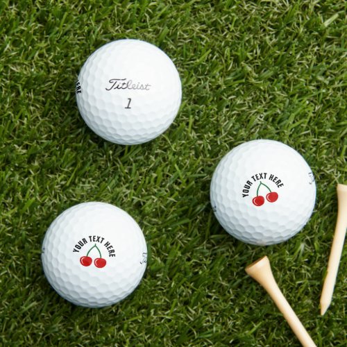 Personalized golf balls with red cherry fruit logo
