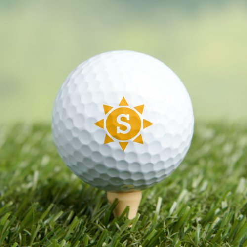 Personalized golf balls with sun logo monogram