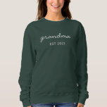 Personalized Grandma Est Year Sweatshirt<br><div class="desc">Celebrate the joy of becoming a grandma with this Personalized Grandma Est. Year Sweatshirt! This cozy and stylish sweatshirt is the perfect way to showcase your special title, featuring a custom established year to mark the moment you became a grandmother. Made from soft, high-quality fabric, it’s a thoughtful gift for...</div>