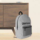 Personalized Gray Printed Backpack<br><div class="desc">Outfit any occasion with a personalized backpack featuring your name in sleek black font! This durable bag comes in a stylish gray,  easily transitioning from day-to-day life to weekend adventures.</div>