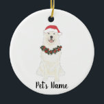 Personalized Great Pyrenees Ceramic Ornament<br><div class="desc">Make the nice list this year with a personalized Christmas ornament of your favorite little great pyrenees elf in a santa hat and red and green holly wreath! For the sweetest gifts,  pair it with a matching art print or another item from my great pyrenees dog collection!</div>