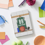 Personalized Green and White Basketball Jersey iPad Pro Cover<br><div class="desc">Green and white basketball jersey hanging in a locker room with a basketball , basketball sneakers and a drinks bottle. The jersey is customizable with your own numbers and name, to create a truly unique gift for the Basketball player or basketball fan. If you require a different color combination contact...</div>
