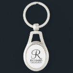 Personalized Groomsman's Name and Monogram Keychain<br><div class="desc">Elegant Black and White Personalized Groomsman Gifts
featuring personalized monogram in black elegant script font style with groomsman's name and title in classic serif font style on white background.

Also perfect for best man,  father of the bride,  bridesmaid,  maid of honor,  flower girl,  mother of the bride and more.</div>