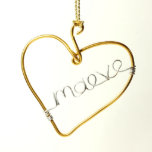 Personalized Heart Shaped Christmas Ornament<br><div class="desc">Personalized Christmas ornaments add an extra special touch to your holiday celebrations.  This gold ornament is hand-shaped into a heart and includes a personalization that is hand-sculpted in wire to create a truly unique and custom ornament,  perfect for gift-giving.</div>