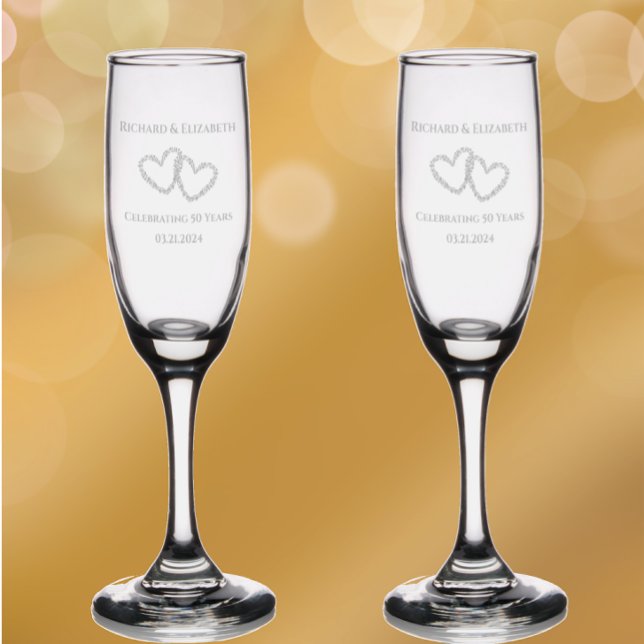 Personalized Hearts 50th Wedding Anniversary Gift Champagne Flute (Personalize these heart 50th anniversary keepsake champagne glasses
)
