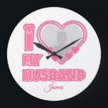 Personalized I Love My Husband – Add Photo & Name Large Clock<br><div class="desc">Find awesome, funny, and delightfully crazy gifts that perfectly capture your love! Whether you're hunting for romantic gift for wife ideas, best Valentine's gifts for her, meaningful wedding anniversary gifts for wife, or best Christmas gifts for wife, our unique designs add a playful twist. Surprise her with psychotically cute (in...</div>