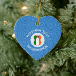 Personalized Irish Angel Hanukkah Flag Ceramic Ornament<br><div class="desc">The flag of Ireland is worn by an angel on heart shaped ceramic ornament item for holiday or Hanukkah decor. The Hanukkah Irish flag angel flies on a background of blue squiggly squares inside a circle of white squiggly squares. Add a name to personalize. Customize with the year. If you...</div>