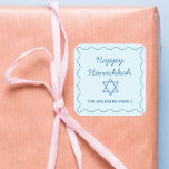 Personalized Jewish Star Blue Happy Hanukkah Gift Square Sticker<br><div class="desc">Add a thoughtful, personal touch to your Hanukkah gifts with these elegant custom stickers. Featuring a soft blue wavy border, "Happy Hanukkah" greeting, and a Star of David, these stickers are a beautiful way to celebrate the holiday season. Customize them with your family name for a unique touch that will...</div>