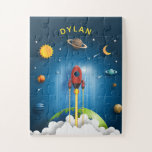 Personalized Kids' Rocket Ship Jigsaw Puzzle<br><div class="desc">Add a child's name to this kids' jigsaw puzzle featuring a rocket ship blasting through clouds surrounded by planets</div>