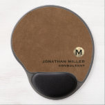 Personalized Leather Print Ergonomic Mousepad<br><div class="desc">Elevate your workspace with this personalized brown leather print ergonomic mousepad. The smooth surface provides precise tracking for your mouse, while the wrist support helps to reduce strain and discomfort during extended use. The design features a luxurious brown leather print and a gold monogram medallion with your name and title....</div>