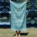 Personalized Life Is Better At The Lake Beach Towel<br><div class="desc">Upgrade your outdoor setup at your lakeside abode with this cute personalized beach towel featuring the phrase "life is better at the lake" in white lettering accented with an anchor and an oar. Personalize with your family name and/or year established beneath. Perfect for lake house housewarming parties, summer homes, or...</div>