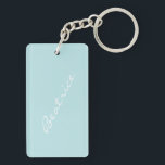 Personalized Light Blue Minimalist Bridesmaid Gift Keychain<br><div class="desc">Carry a personal touch wherever you go with this personalized light blue name keychain. Featuring a soft pastel blue background and elegant script typography, this custom keychain makes a thoughtful gift for friends, family, or as a stylish accessory for your keys, bag, or backpack. Perfect for birthdays, bridesmaid gifts, or...</div>