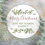 Personalized Merry Christmas Greenery Family  Classic Round Sticker<br><div class="desc">Watercolor greenery frames elegant script Merry Christmas typography on these elegant holiday stickers. Personalize with your family name. Designed by Thisisnotme©</div>