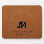Personalized Minimal Sable Leather Monogram Mouse Pad<br><div class="desc">Add a touch of luxury to your workspace with this personalized mouse pad. The design features two overlapping monogram initials in classic black block typography with your name and title below on a stylish sable brown leather background. The high-quality printing ensures that the design will last for years to come....</div>