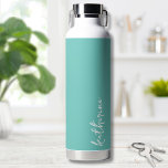 Personalized Minimalist Name Water Bottle<br><div class="desc">Simple yet stunning.  Personalize this water bottle with your name,  or a loved ones name.  A simple elegant script typography with a girly edge.  Change out the background and font colors to anything you want. Chic Trendy Simple Your Name Minimalist Water Bottle</div>