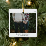 Personalized Minimalistic Single Photo Christmas Ceramic Ornament<br><div class="desc">Celebrate the holiday season with our Personalized Minimalistic Single Photo Christmas Ceramic Ornament. This elegant ornament combines classic traditional charm with a sleek, minimalistic design. Featuring a timeless black and white color scheme, it offers a clean and simple aesthetic that will complement any Christmas tree. Customizable with a single photo,...</div>