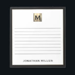 Personalized Monogrammed Lined Notepad<br><div class="desc">Keep your notes organized and stylish with this personalized lined notepad featuring a sleek black and gold initial monogram. With plenty of lined pages, this notepad is perfect for jotting down ideas, taking notes, or making to-do lists. The classic block typography and black trim give it a professional and sophisticated...</div>