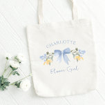 Personalized Name Dusty Blue Cute Bow Flower Girl Tote Bag<br><div class="desc">Effortlessly chic, this customizable "Flower Girl" tote bag is the perfect keepsake to celebrate your little wedding star. This tote bag blends whimsy with elegance, featuring a soft dusty blue bow illustration complemented by delicate yellow and white florals. Personalize it with her name to make it uniquely hers and an...</div>