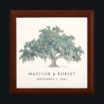 Personalized Names Oak Tree Wedding Keepsake Gift Box<br><div class="desc">Honor a love that continues to grow with this Personalized Names Oak Tree Wedding Keepsake Gift Box. Featuring a beautifully illustrated oak tree, this design symbolizes strength, longevity, and deep roots—making it a meaningful choice for celebrating marriage and lasting commitment. The couple’s names are personalized within the design, along with...</div>