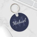 Personalized Navy Blue Monogram and Name Keychain<br><div class="desc">Personalized Monogram and Name Gift
features personalized name in white script font style and monogram in light navy blue serif font style as background,  on navy blue background.

Perfect as holiday gift,  family reunion favors,  thank you gift for groomsmen and gift for any special occasions.</div>