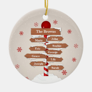 Personalized North Pole 9 Family Names Ceramic Ornament