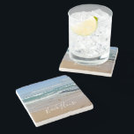 Personalized Ocean Beach House Stone Coaster<br><div class="desc">Add personalized style to your bathroom with this beach-themed stone coaster. The design features a one-of-a-kind photograph of the tranquil blue waves and soft sand of coastal Melbourne,  Australia. The modern,  white text is customizable so you can add your own family name.</div>