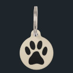 Personalized paw print pet tag for dog or cat<br><div class="desc">Personalized paw print pet tag for dog or cat. Customizable doggie label with pet name and phone number. Simple way to retrieve your animal pet. Nice Birthday gift for new puppy,  terrier,  collie,  sheepdog etc. Available in small and large size.</div>