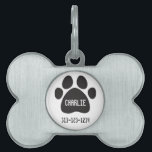 Personalized Pet Tag/Paw Print Tag<br><div class="desc">Personalized Pet Tag/Paw Print with Name and Telephone Number Give your four-legged friend the best with a custom bone-shaped pet tag. Made of burnished silver and printed in vibrant color, your images, designs, and text will display beautifully from any collar. Designed to withstand the wear and tear of even the...</div>