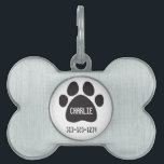 Personalized Pet Tag/Paw Print Tag<br><div class="desc">Personalized Pet Tag/Paw Print with Name and Telephone Number Give your four-legged friend the best with a custom bone-shaped pet tag. Made of burnished silver and printed in vibrant color, your images, designs, and text will display beautifully from any collar. Designed to withstand the wear and tear of even the...</div>