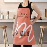 Personalized Pink Black Modern Script Monogram Apron<br><div class="desc">Elevate your cooking experience with our Personalized Pink Monogram Apron, featuring a chic modern script that adds a touch of elegance to your kitchen attire. This stylish apron is perfect for chefs of all levels who appreciate both function and fashion. Crafted from high-quality materials, it ensures durability and comfort, making...</div>