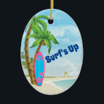 Personalized Pink Blue Surfboard Surfing Christmas Ceramic Ornament<br><div class="desc">This Surf's Up holiday Christmas tree ornament features a pink and blue surfboard with tropical flowers.  There are palm trees and a refreshing beach background.  It can be personalized with a name,  year or any text that you wish to add.   ^</div>