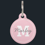 Personalized Pink Monogram Pet Name Pet ID Tag<br><div class="desc">Modern pet ID tags featuring a pastel pink background,  your dogs initial,  name and your phone number on the back.</div>
