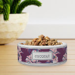 Personalized Pink Tropical Floral Pattern Pet<br><div class="desc">For the pets with the most aloha,  this cute island inspired dog or cat bowl features a pattern of tropical orchid flowers and botanical foliage in shades of blush pink,  lavender,  and blue on a purple background. Personalize with your pet's name in dark navy lettering.</div>