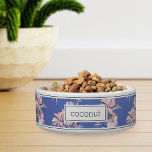 Personalized Pink Tropical Floral Pattern Pet Bowl<br><div class="desc">For the pets with the most aloha,  this cute island inspired dog or cat bowl features a pattern of tropical orchid flowers and botanical foliage in shades of blush pink,  lavender,  and blue on a french blue background. Personalize with your pet's name in dark navy lettering.</div>