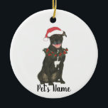 Personalized Pitbull Staffy (Black) Ceramic Ornament<br><div class="desc">Make the nice list this year with an ornament of your favorite pitbull elf! Love this happy little black staffy in a santa hat and holly wreath outfit. Perfect for pitbull's first Christmas, new rescue, pet sympathy, housewarming, hostess, in-laws, or tough-to-shop-for occasions! For the sweetest gifts, pair it with a...</div>